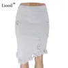 Лиооль Асимметричный хлопок черная белая дырка джинсовая юбка MIDI с кисточкой уличной одежды с высокой талией мытью женщин Bodycon юбка 210303