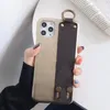 Fashion Luxury Phone Cases for iphone 15 15pro 14 14pro 14plus 13 13pro 12 pro max 11 11pro XS XR XsMax Designer Pattern Leather Wristband Phone Cover