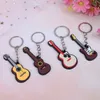 Nieuwe 2 stks Zachte Siliconen Instrument Keychain Folk Electric Classical Guitar Ukulele Sleutelhanger Hoge kwaliteit Groothandel G1019