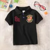 Söt Baby Boys Girls Bomull T-shirts Sommar Kids Kortärmad T-shirt Barn Casual Turn-down Collar SHIRTS Barnplattor Tees Barnkläder 2-12 år