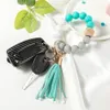 NOUVEAUTÉPorte-clés jonc perlé en silicone avec gland pour les femmes Party Favor, bracelet porte-clés Bracelet RRD12095