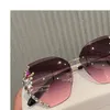 Moda rimless güneş gözlükleri kadın lüks tasarım bling rhinestone güneş gözlükleri gradyan kesici lens vintage tonları whole1607750