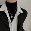 Collana con ciondolo di marca rotonda con design in acciaio al titanio per tutto il corpo, catena clavicola femminile, accessori per catena maglione hip hop stile cool