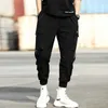 Hip-Hop Street Jogger Sports الرجال الأسود الحريم السراويل متعددة جيب الشريط عارضة M-3XL 210715