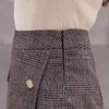 秋のポケットウールの暖かい冬のショーツ女性スリムなファッションボタンチェック柄スカートレトロな女性のプラスサイズのミニスカート210311