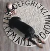 tapis rond pour bébé