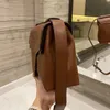 Bolsos de sillín de hombro a la moda, bolsos cruzados con letras de marca de diseñador de lujo, bolso de teléfono con cerradura para mujer, monedero, bolsos metálicos