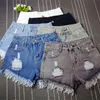 Jeans feminino Setter de tendência feminino 2022 Vintage de verão de jeans Rapped shorts Mulheres 6xl Fringe casual Plus Size Gril