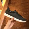 Män Fritidsskor kvinnor Resor 100 % läder snörning sneaker mode dam designer Löparträningsskor Bokstäver kvinna sko Platta tryckta gym sneakers storlek 35-41-42-45 Med låda