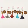 Party bevorzugt hölzerne Perlenschlüsselkette mit runden Holzspänen und Baumwollquasten -Anhänger Key Ring Custom Sublimation Logo