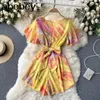 Frauen Boho Blumen Strampler Retro fliegende Ärmel V-Ausschnitt Schärpen Casual Overall Sommer Urlaub Strand breites Bein kurze Strampler 210715