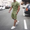 Mäns strand två bitar Set Shortwear Round Neck Jogging Set Sommar Solid Färg Shorts Loose Fashion Running Leisure Track Suit 210726