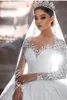 Abiti da sposa vintage con maniche lunghe in pizzo e abiti da sposa Dubai Arabo con collo trasparente e applicazioni senza schienale con paillettes Abiti da sposa di lusso Robe de mariage BC11371