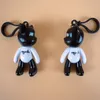 Porte-clés en résine figurine d'action ours noir et blanc en plastique accessoires de dessin animé petits cadeaux