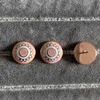 2021 Orecchini pendenti dal design classico alto lucidato Orecchini in acciaio inossidabile con pietra CZ di piccole dimensioni per il commercio all'ingrosso di gioielli da donna