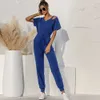 Elegancki z krótkim rękawem V-Neck Lace Up Kombinezon Kobiety Lato Solidne Hollow Out Backless Casual Slim Kombinezon Office Lady Long Romper 210526