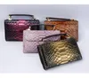 Plånböcker lyx ankomst 2021 mode telefon plånbok väska python lady kedja koppling krokodil hud väskor kvinnor handbag7445628