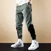 Jesień Ly Designer Fashion Men Jeans łączone naszywki Casual sztruksowe spodnie Cargo kombinezony Streetwear hiphopowe spodnie do biegania