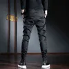 男性カジュアルパンツ韓国のストリートウェアブラックストレッチスリムフィットズボン211201
