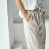Spodnie damskie Capris Micoco K3021B wersja koreańska jest rekreacyjne i proste sens ciągnie Linę luźną talię, aby pokazać cienkie dziewięć punktów