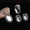 Orecchini Collana Set di vendita Gioielli di moda color argento vintage Gioielli con fiori carini Set di anelli di cristallo grigio grande per regalo da donna