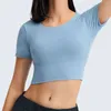 Nepoagym OUTWIT Women Open Back Workout Crop Tops with Built In Bra Backless Yoga Shirts Cross Back Short Sleeve Athletic Tees 211217