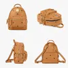 5A Leather Handbags High Quality men and women School Backpack famous Rivet printing Backpack Designer lady Bags Boy and Girl back319P