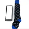 Chaussettes pour hommes de créateurs bas Designer Hommes Femmes Chaussettes bas de laine de haute qualité rues seniors confortable genou jambe chaussette ATCG