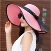 القبعات الصيفية الإناث شمس القبعات القبعة الكبيرة الحافة الكلاسيكية القوس قبلة القش قبعة غير رسمية في الهواء الطلق قبعة الشاطئ للنساء UV حماية قبعة