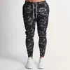 Mode män ny camo print joggare penna byxor manlig sida randig elastisk midja dragsko kamouflage byxa casual byxor