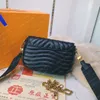 2021 Nieuwe Golf Multi Pochette Luxe Crossbody Tas met Munt Pouch Veelzijdige Portemonnee Tiny Handtas Gouden Ketting Schoudertassen Lederen Koppeling in Zwart Wit M56461