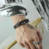 Bijoux transfrontaliers bracelet en cuir tissé multicouche rétro crâne de mode de rue européenne et américaine