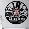 Orologi da parete 1pc Barber Shop Salone di bellezza Orologio Strumenti per taglio di capelli Vintage Record Silhouette Decor Parrucchiere Regalo