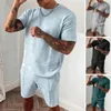 le tute casual da uomo estive si adattano a pantaloncini a maniche corte più abbigliamento sportivo in due pezzi da uomo alla moda