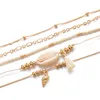 Braccialetti con ciondoli 1 Set braccialetto di conchiglie naturali di moda per le donne BOHO catena di perline color oro intrecciata a mano gioielli con nappa 2021