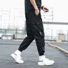 Poches latérales pour hommes Cargo Harem Pantalon Rubans Noir Hip Hop Casual Homme Joggers Pantalon De Mode Streetwear 210715