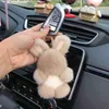 Kaninkedja söt riktig mink päls bil Hanbag ring fluffig mjuk boll nyckelhållare för kvinnor väska hänge tillbehör dropshiping