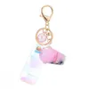 Cute Mini Bottle Keychain Diy Milk Tea Keyring Moving Liquid Bag Charm Jewelry Accessories Women Luxury Cool Gift Wholesale G1019