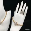 Trendy bloem diamant ketting sieraden set glanzende strass armband open ring crtstal kettingen metalen ketting dubbele letter armbanden