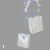 イブニングバッグレトロチェーンリベット大容量トートデザイナー2021女性ショルダーラグジュアリーPUレザーメッセンジャーバッグレディビッグバケット財布