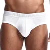 Brev Skriv ut Män Briefs Padded Low Rise Sexiga Underbyxor Sömlös Andbar Solid Färg Man Underkläder 210707