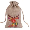 Jul Burlap Linne Drawstring Bag Present Wraps Santa Claus Snowman Penguin Elk Candy Smycken Förpackning Presentförvaring Väskor Xmas Favoriter Dekoration TR0084