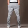 الرجال السراويل الرجال ركض عارضة اللياقة البدنية الرجال الرياضية رياضية قيعان جيوب كبيرة sweatpants سراويل اسود رياضة عداء ببطء المسار