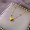 Colliers à pendentif en chaîne de perles concises, chaînes fines avec petites boules et décoration de cœur, collier luxueux pour femmes, vente en gros