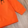 Baby Girl Boy Set di vestiti Primavera Autunno Bambini Abiti Top manica lunga stampata arancione + Pantaloni teschio Abito bambino cinese Abbigliamento per bambini
