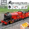 Le modèle de train à vapeur magique blocs de construction moule roi 12010 APP RC trains motorisés assemblage briques éducation enfants cadeaux de noël jouets d'anniversaire pour les enfants