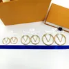 Классические письма дизайнерские серьги жены круглые подвесные шпильки Golden Sil