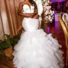 Afrikansk plus -storlek sjöjungfrun klänningar med spaghettiband satin som kastar ren v hals spets applikationskolat kjol tyll bröllopsklänning