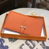 Monedero de diseño de lujo de cuero genuino para mujer, bolso de dinero largo a la moda, tarjetero para teléfono, carteras de mano