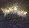 LED Fluffy Feather Antlers Fascia per capelli Natale Incandescente Light Up Lampeggiante Orecchie di cervo Fascia per capelli Costume Fancy Cosplay Decorazioni per feste con batteria